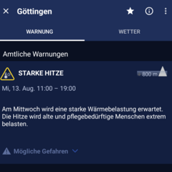 Bildschirmfoto der DWD-Warnapp vom 12-8-25 mit einer Hitzewarnung der Stufe 1 für Mittwoch 13-8-25 in der Zeit von 11-19 Uhr