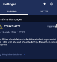 Bildschirmfoto der DWD-Warnapp vom 12-8-25 mit einer Hitzewarnung der Stufe 1 für Mittwoch 13-8-25 in der Zeit von 11-19 Uhr